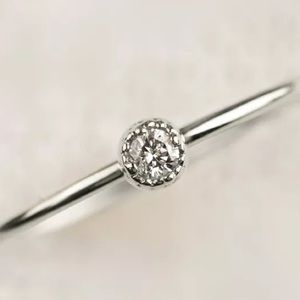 Dainty Thin Ring Dipped In White Gold...